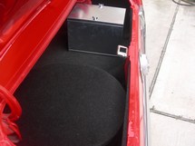 The trunk after the carpeted panels were installed, along with the Taylor aluminum battery box.